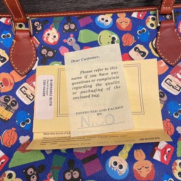 Disney Pixar Fest Shopper Tote by Dooney & Bourke.